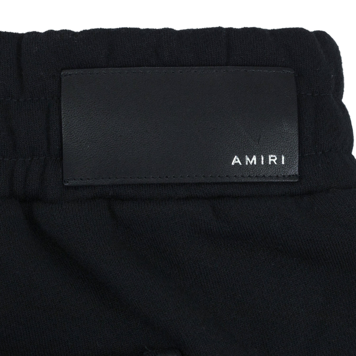 Black AMIRI STAGGERED SWEATPANT